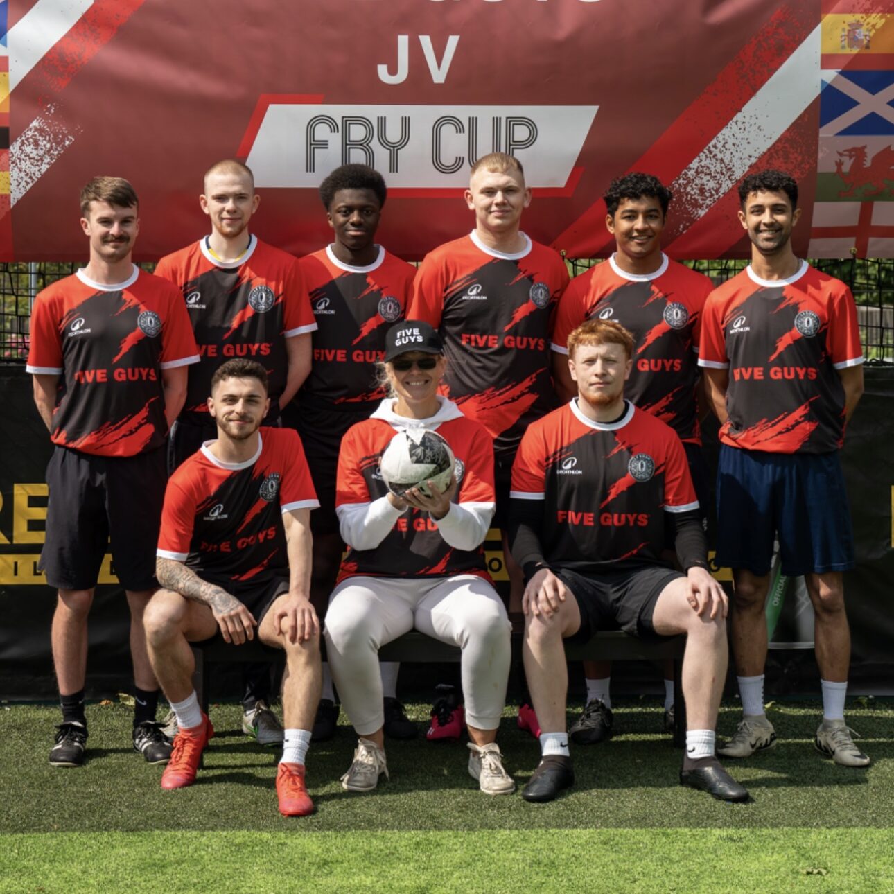 Red and black Decathlon custom football kit, worn by Le Bosh FC.