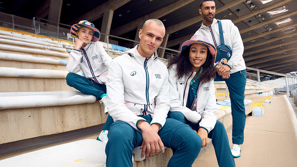 Athletes wearing custom Decathlon training wear for Paris 2024 Olympics.